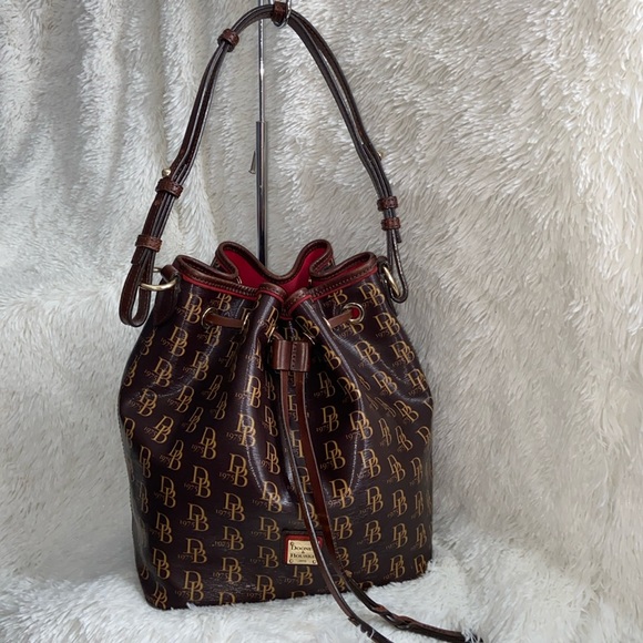Dooney & Bourke Handbags - Dooney & Bourke Drawstring Bag Signature Collection Brown vintage Kendall Sutton